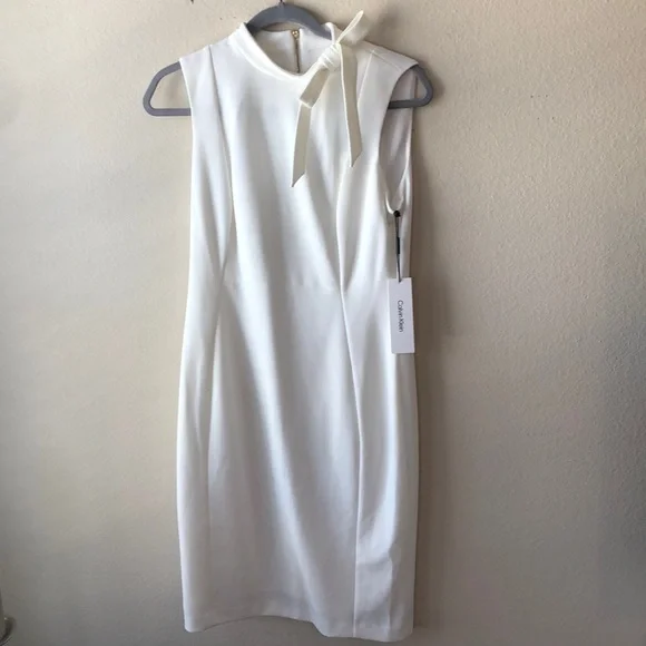 calvin klein white dress Wedding this shirtdress offers a modern take on a classic silhouette Summer 2026 is all about